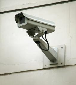 cctv camera grey on wall